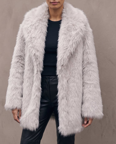 Model wearing the light gray Ballerina Faux Fur Coat open, front view with wide collar framing the neckline
