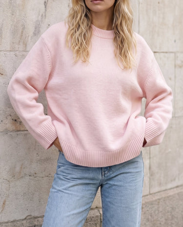 The Blush Sweater in pink — front view on model