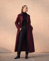 The Burgundy Celine Coat in burgundy — full-length front view on model