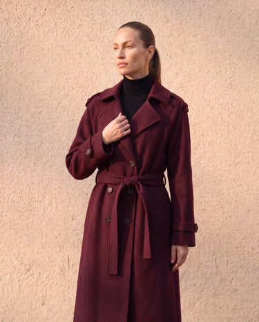 The Burgundy Celine Coat in burgundy — front view on model