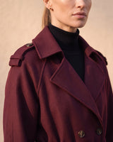 The Burgundy Celine Coat in burgundy — close-up of the notch lapel and double-breasted buttons