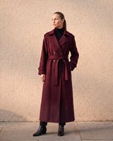 The Burgundy Celine Coat in burgundy — side view on model