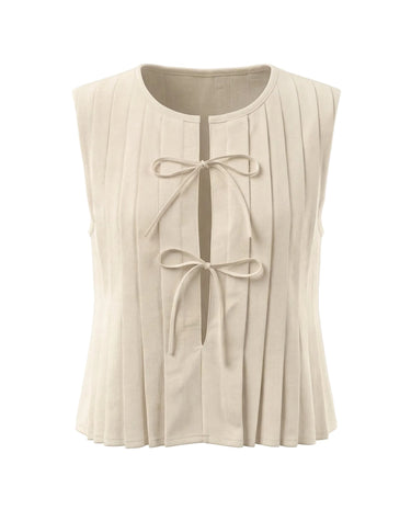 The Cala Cotton Linen Tie Top in beige — sleeveless pleated crew-neck top with front bow ties, product flat-lay