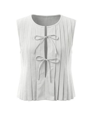 The Cala Cotton Linen Tie Top in white — sleeveless pleated crew-neck top with front bow ties, product flat-lay