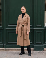 The Calvera double-breasted wool coat in khaki — front view on model