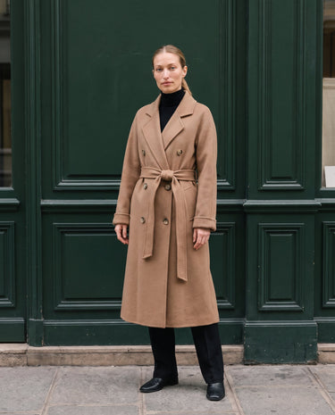 The Calvera double-breasted wool coat in khaki — front view on model