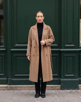 The Calvera double-breasted wool coat in khaki — front view on model