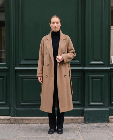 The Calvera double-breasted wool coat in khaki — front view on model