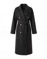 The Calvera double-breasted wool coat in black — belted maxi coat with notch collar, product flat-lay