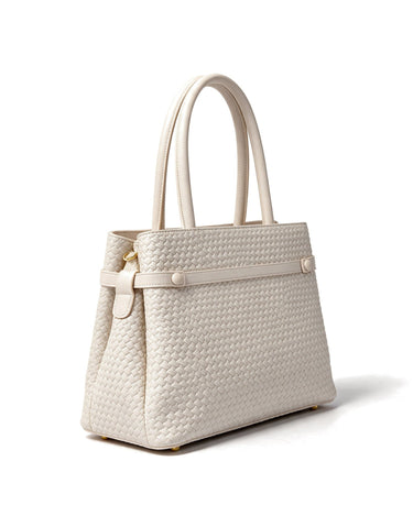 The Camille Handbag in ivory, three-quarter rear view showing the side strap and woven back panel