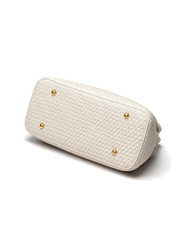 The Camille Handbag in ivory, base view showing the gold-tone protective feet
