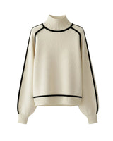 The Camille sweater in white — high-neck knit sweater with contrast piping and lantern sleeves, product flat-lay