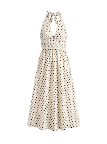 The Capri Polka Dot Dress in cream — polka-dot halter maxi dress with V-neck, product flat-lay