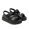 The Celeste Sandal in black — chunky platform sandals with double buckle straps, angled pair view