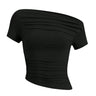 Black fitted boat-neck top with pintuck bust detail and short sleeves, flat-lay front view – Moriel Heritage