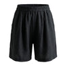 The Ciente Cotton Shorts in black — elastic-waist pull-on cotton shorts, product flat-lay