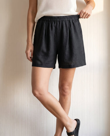The Ciente Cotton Shorts in black — cotton shorts, front view on model