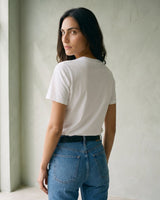 The Cotton Everyday Tee in white — crew-neck cotton t-shirt, back view on model