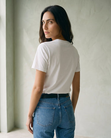 The Cotton Everyday Tee in white — crew-neck cotton t-shirt, back view on model