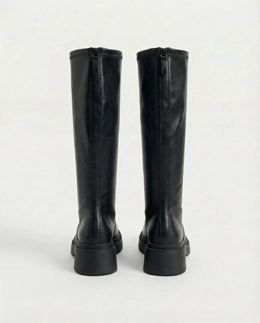 The Elara Slim Riding Boots in black — knee-high riding boots, back view
