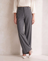 The Elin Wide Leg Tailored Pants in dark gray — wide-leg suit trousers, front view on model