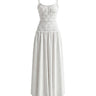 The Elire Dress in white — shirred bodice tiered maxi dress with thin straps, product front view