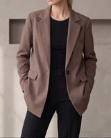 The Elle Blazer in brown — front view on model