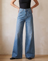 The Elodie jeans in blue — front view on model