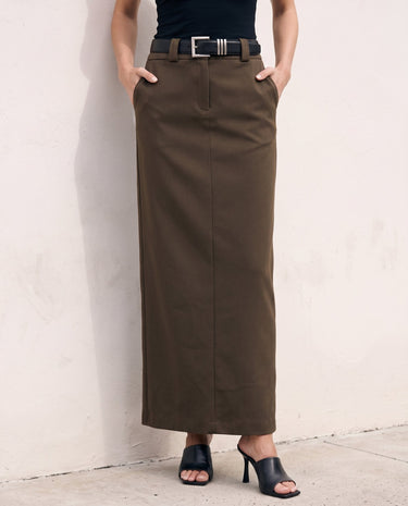 The Eloise Tailored Skirt in brown — straight maxi skirt, front view on model