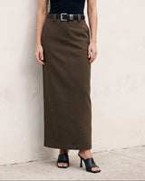 The Eloise Tailored Skirt in brown — straight maxi skirt, full front view on model