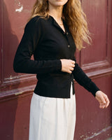 The Elsa Cardi in black — front view on model