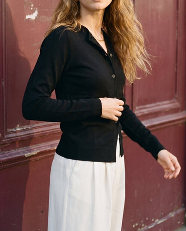 The Elsa Cardi in black — front view on model