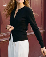 The Elsa Cardi in black — front view on model