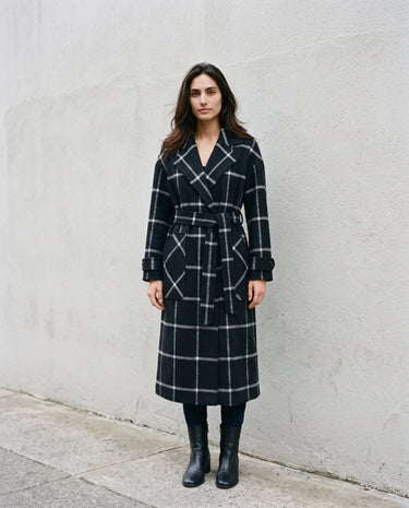 The Emilia Grid Longline Coat in black windowpane check — longline coat, front view on model