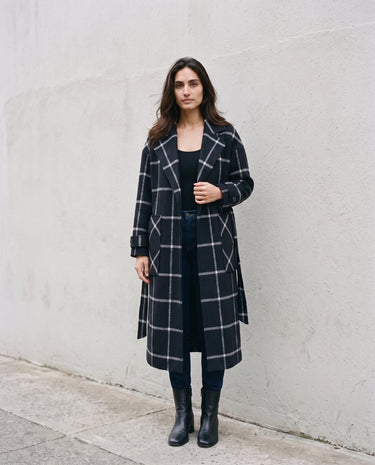 The Emilia Grid Longline Coat in black windowpane check — longline coat worn open, front view on model
