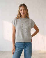 The Floral Embroider Top in light gray — short-sleeve knit top, three-quarter view on model