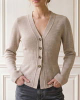 The Harlow Cardi in khaki — V-neck button-front knit cardigan, front view on model