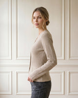 The Harlow Cardi in khaki — slim ribbed knit cardigan, side view on model
