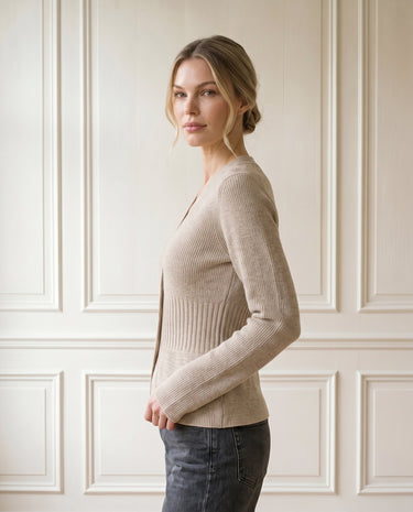 The Harlow Cardi in khaki — slim ribbed knit cardigan, side view on model
