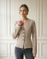 The Harlow Cardi in khaki — button-front knit cardigan, front three-quarter view on model