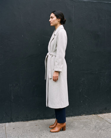 The Haven Tie Waist Coat in light gray — long wrap coat, side view on model