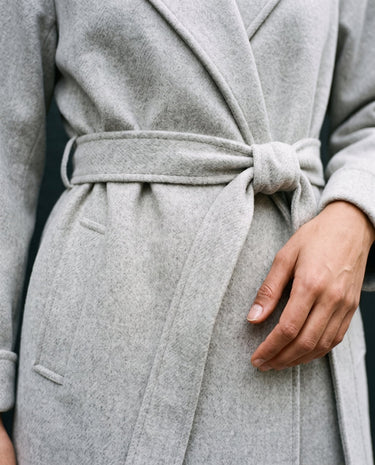 The Haven Tie Waist Coat in light gray — close-up of the tie waist belt