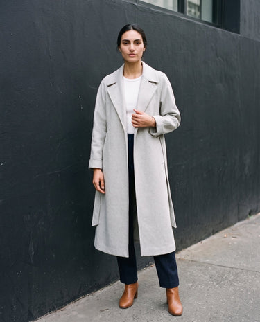 The Haven Tie Waist Coat in light gray — long wrap coat worn open, front view on model