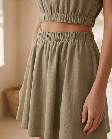 The Isola Cotton & Linen Skirt Set in khaki — close-up of elastic waist and flared skirt