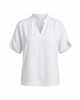 White short-sleeve blouse with a stand collar and split V neckline, flat lay on white – Moriel Heritage