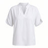 White short-sleeve blouse with a stand collar and split V neckline, flat lay on white – Moriel Heritage