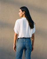 Back view of the white blouse showing the relaxed shoulder line – Moriel Heritage