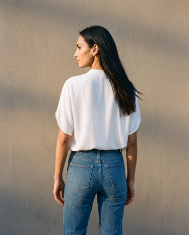 Back view of the white blouse showing the relaxed shoulder line – Moriel Heritage