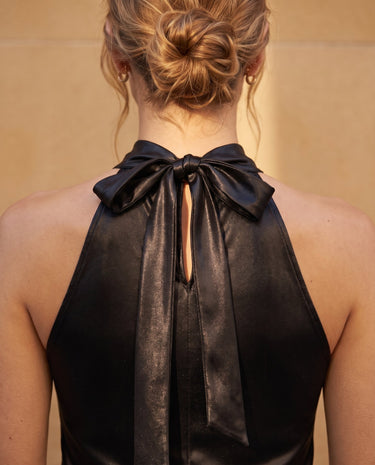 Close-up of the halter top's back neck bow and keyhole opening – Moriel Heritage