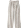 The Loelia Linen Pants in natural linen — high-waisted wide-leg drawstring linen trousers, product flat-lay